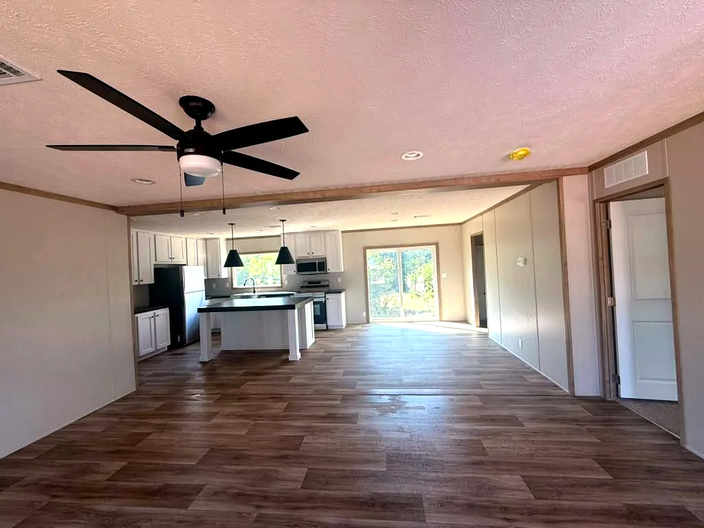 Finished living area and kitchen by Tidy Up